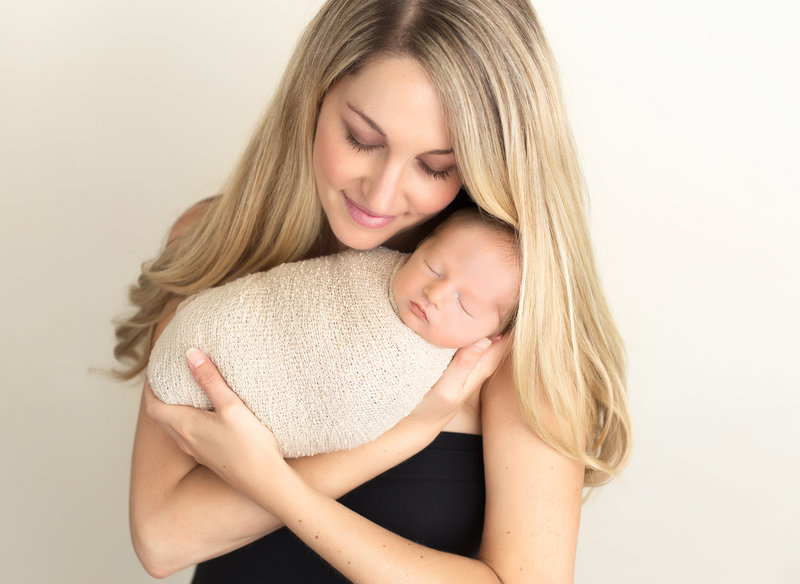 blonde mom with baby