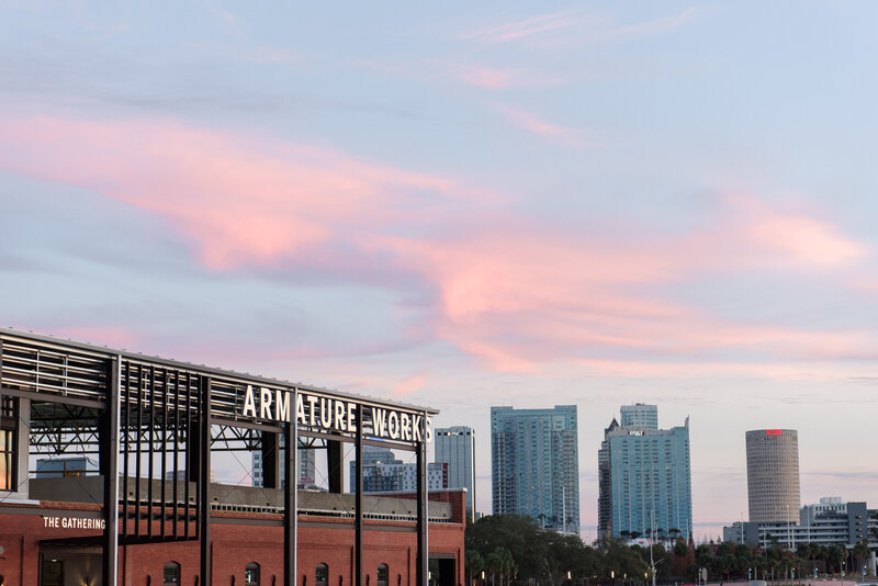 Tampa skyline under blue sky and pink clouds