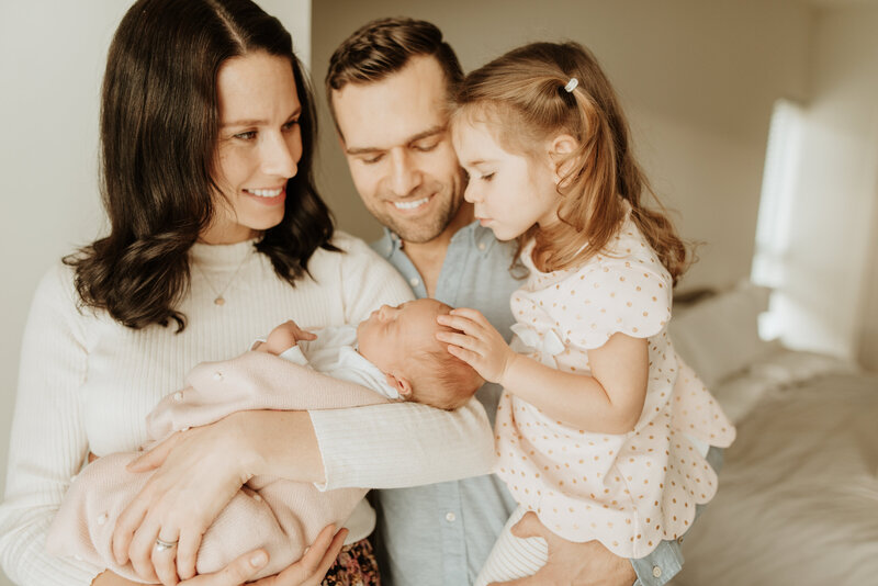 Mom and baby snuggled up at a Vancouver Newborn Photography session