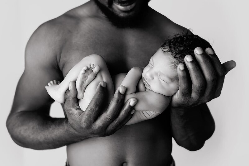 Father and newborn photography