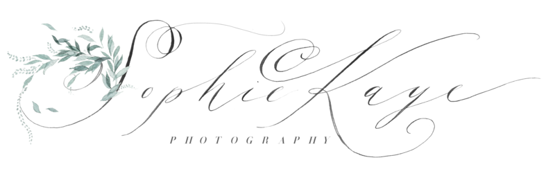 A logo of a wedding photographer