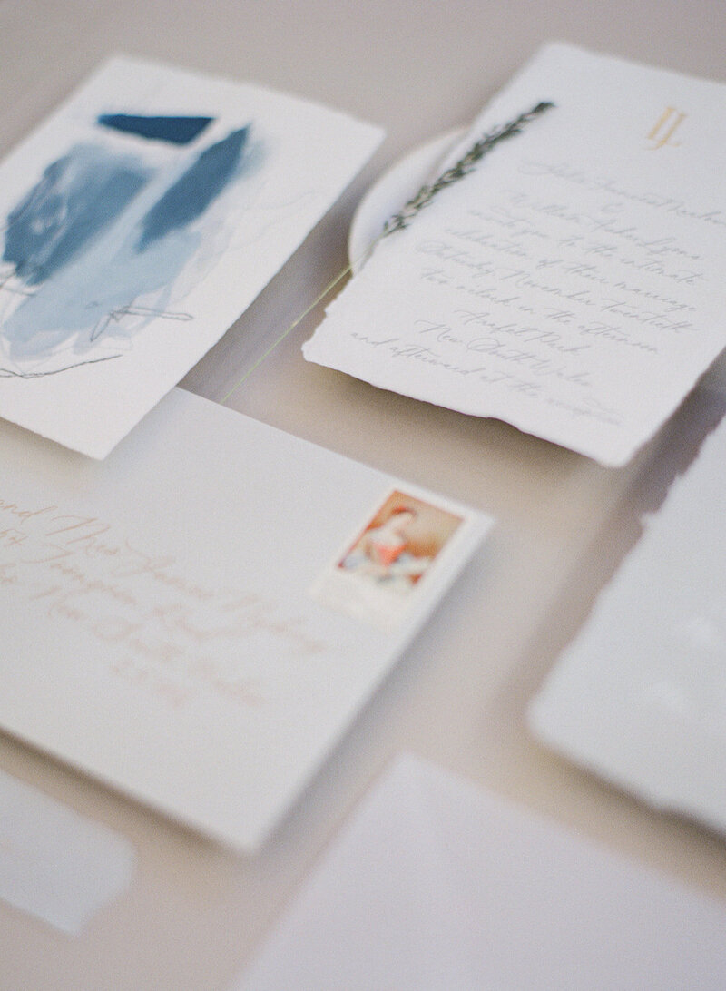 Handmade paper and modern calligraphy wedding invitations
