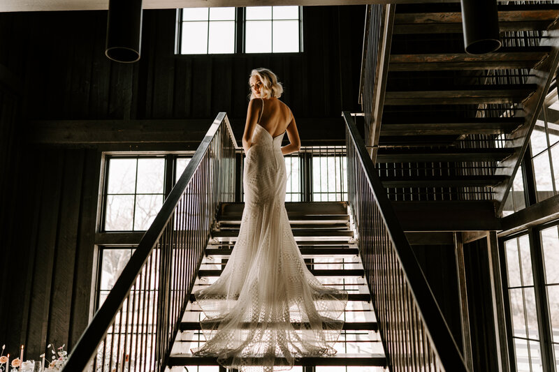 Bride on stairs at Spain ranch, Tulsa