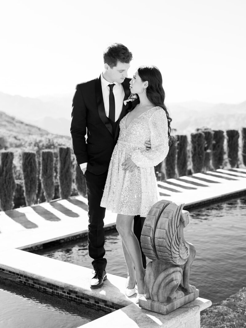 Engagement couple at luxurious pool