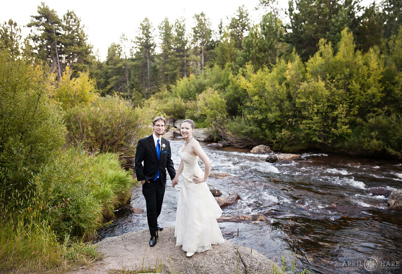 Cute Saint Vrain River wedding portrait at Wild Basin Lodge in Allenspark Colorado