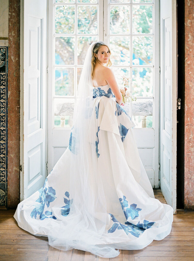 Beautiful Bride in a Monique Lhuillier dress just before her wedding ceremony in a 17th century Portuguese Palace by Sofia Nascimento Studios