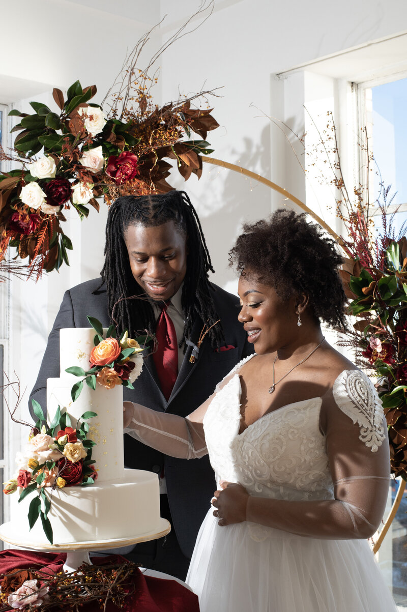 Toni and Dre were all smiles cutting this gorgeous cake for our intimate wedding styled shoot