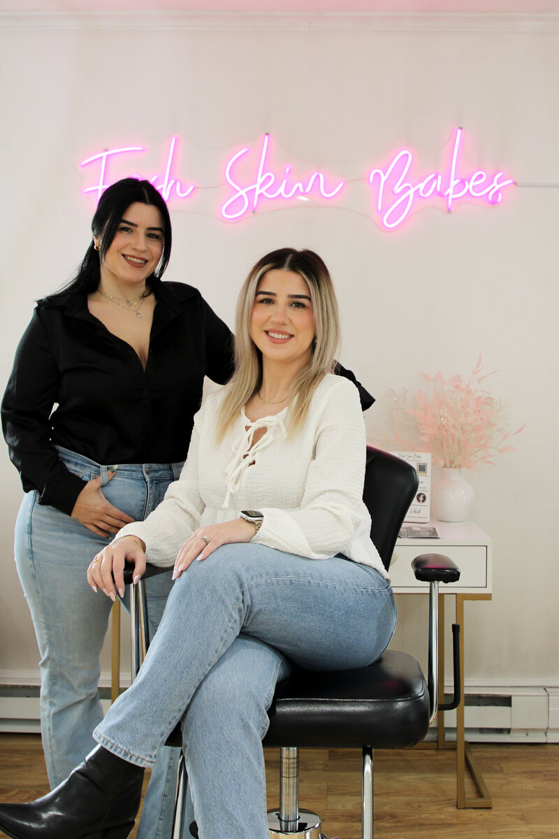 Nicole and Diana from Fresh Skin Babes preparing for a client appointment in the studio.