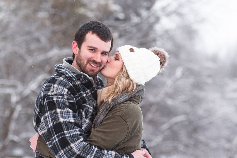 snowy engagement photos at quail hollow state park in hartville ohio photographed by Jamie Lynette Photography  Canton Ohio Wedding and Senior Photographer