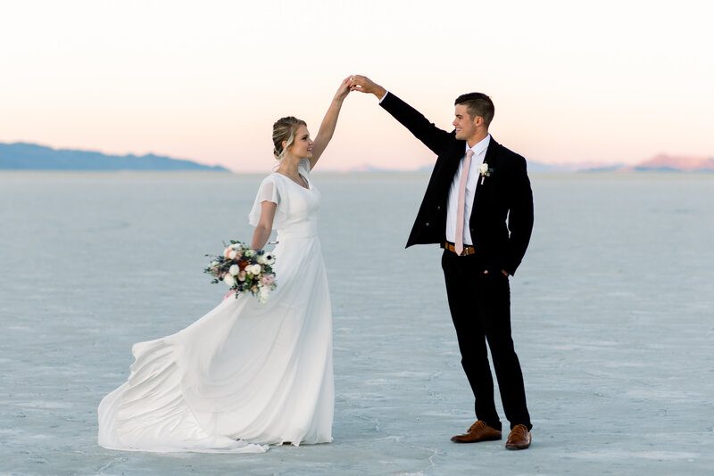 Soft romantic couple nose to nose smiling on during their Utah Wedding at the Bonneville Salt Flats taken by Utah wedding photographer Andria Joleen Photography