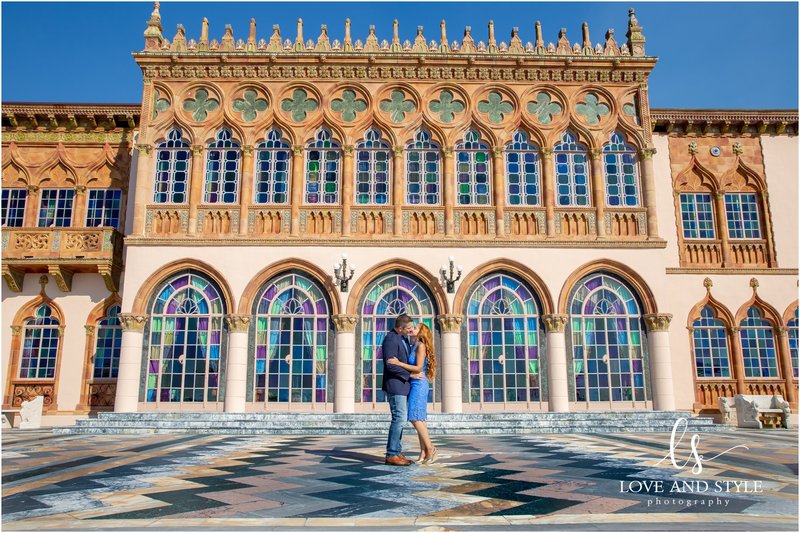 a wide angle engagement photo taken in front of the Cad'a'zan at The Ringling by love and style photography