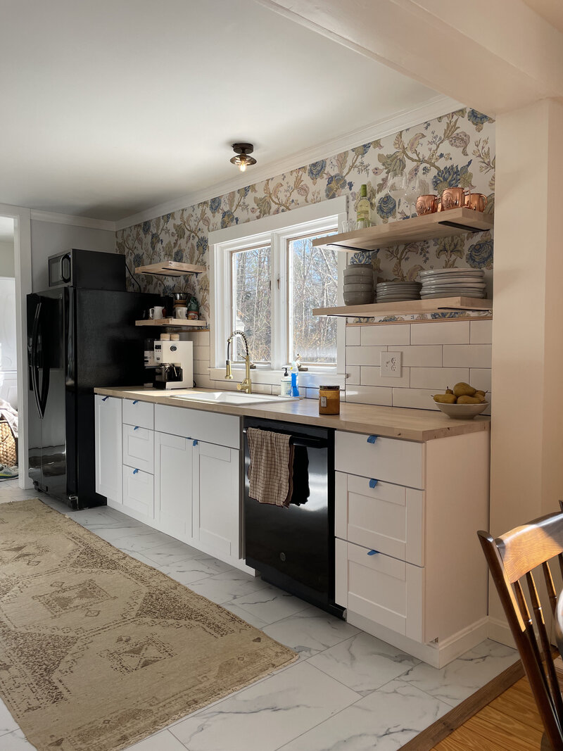 Laundry Room renovation by Nadine Stay. Rustic dark wood walls with basketweave brick floors. Brown door paint color. Mudroom built in cabinets.