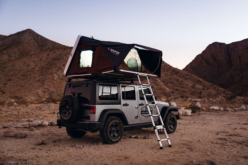 Jeep Wrangler in desert with roof to tent
