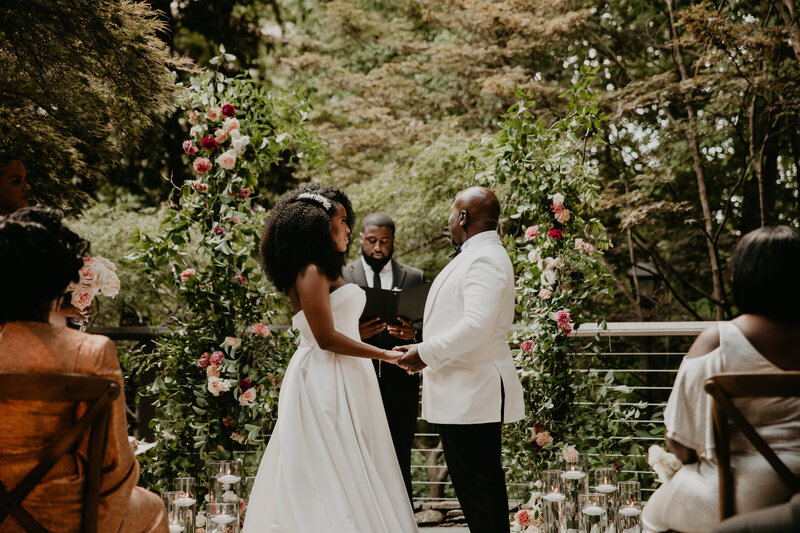 black-couple-exchanging-vows-at-crown-ravinia-perimeter-garden-indee-fox-photography