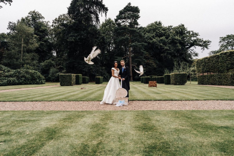 Iscoyd Park wedding couple with doves