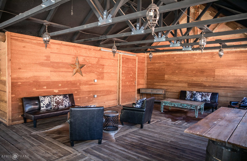 Cocktail lounge area under covered deck at Piney River Ranch