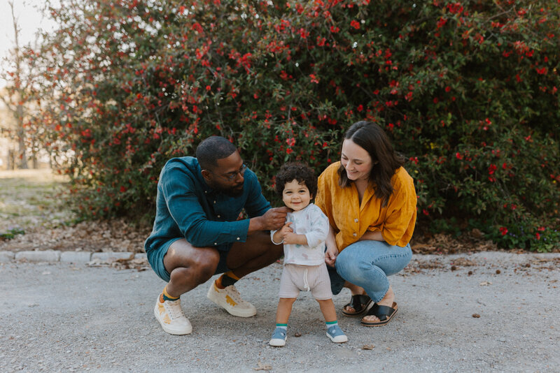 Couple with young toddler at a park