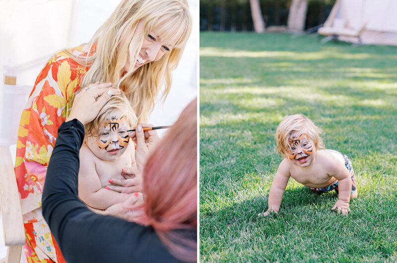 A child gets his face painted like a tiger during his birthday party portraits in Malibu