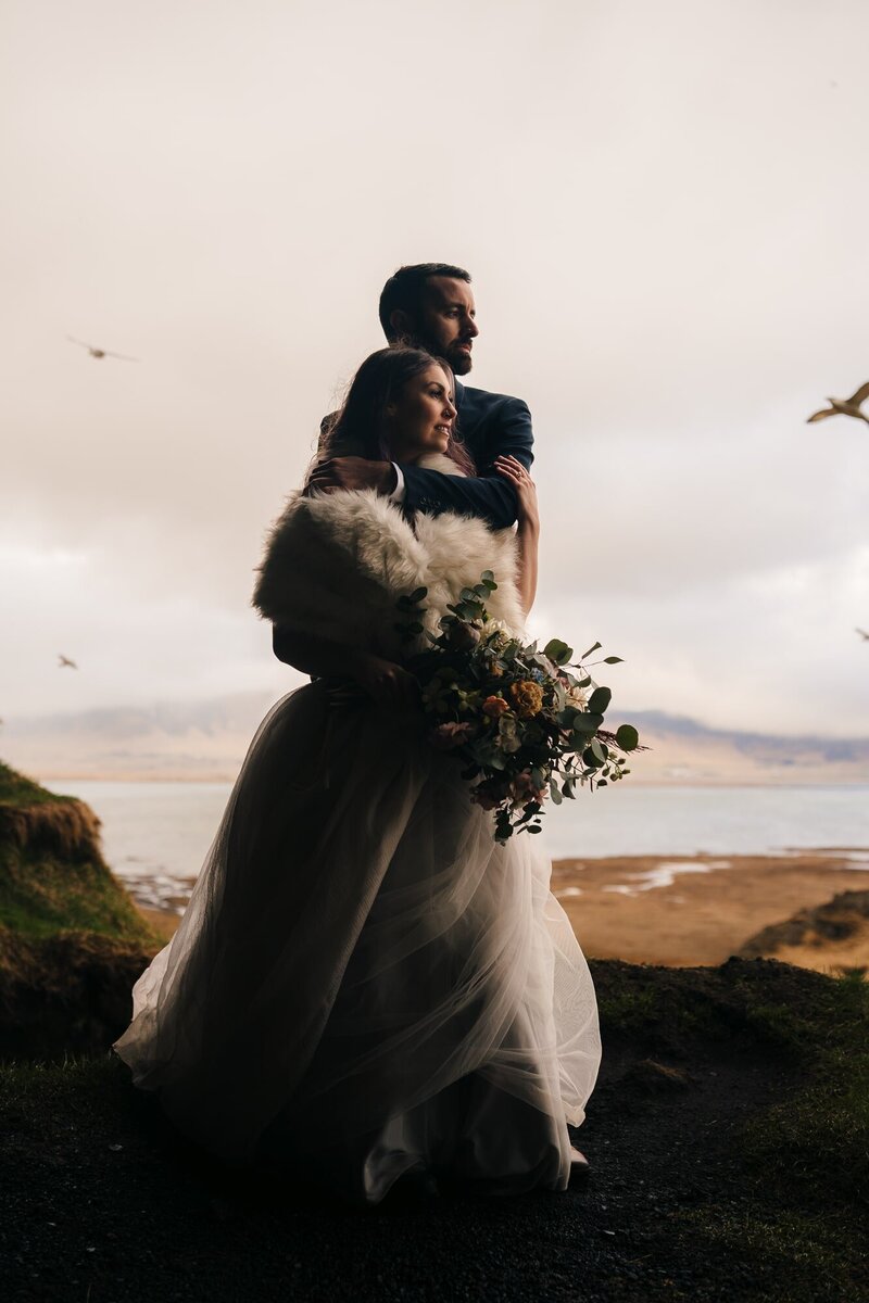 Couple in a cave during their elopement in Iceland