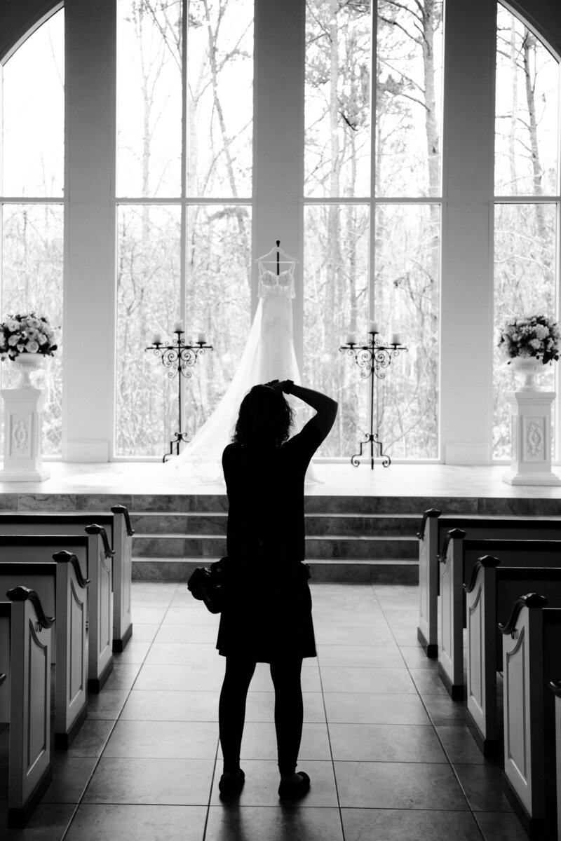 Wedding Photographer in Atlanta photographing a dress at Ashton Gardens