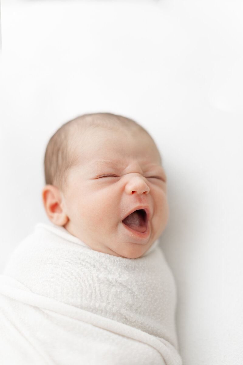 newborn baby yawns