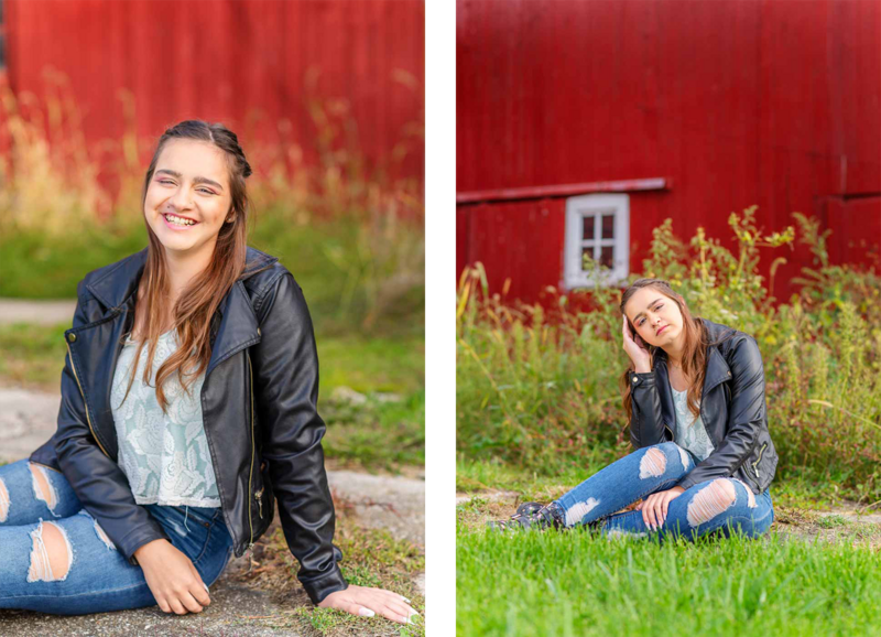high school senior girl sitting infront of red barn
