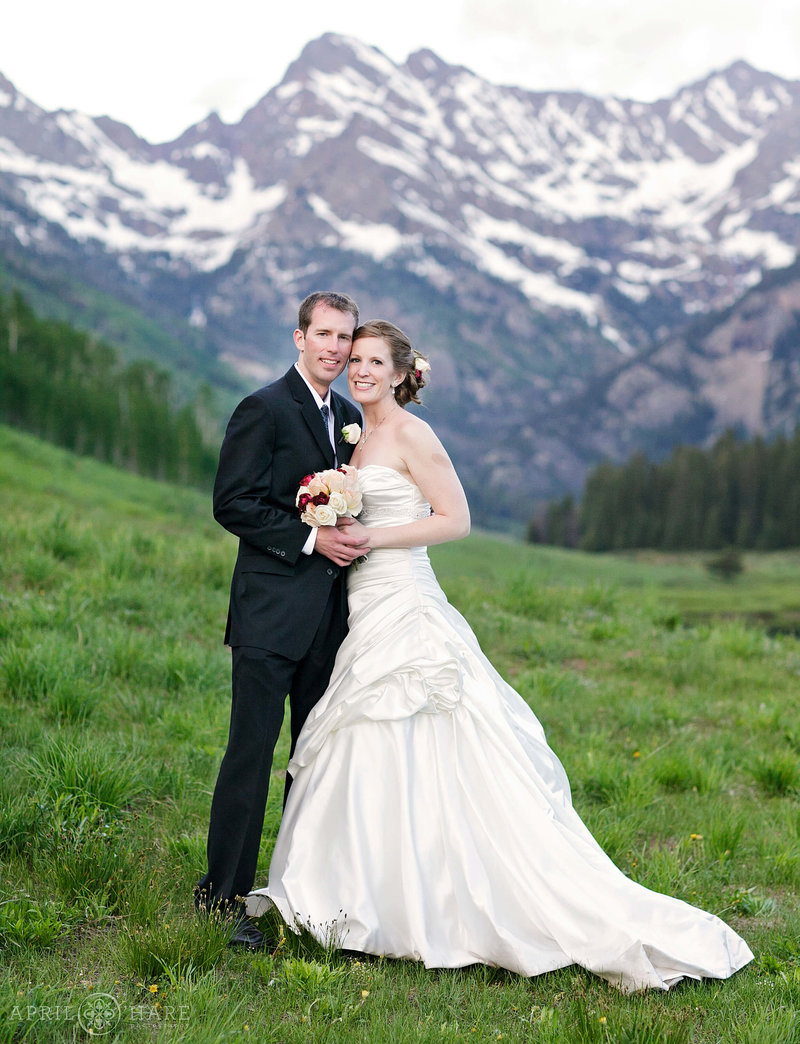 Bride and Groom portrait at Sunset with Mountain Views in Vail at Piney River Ranch