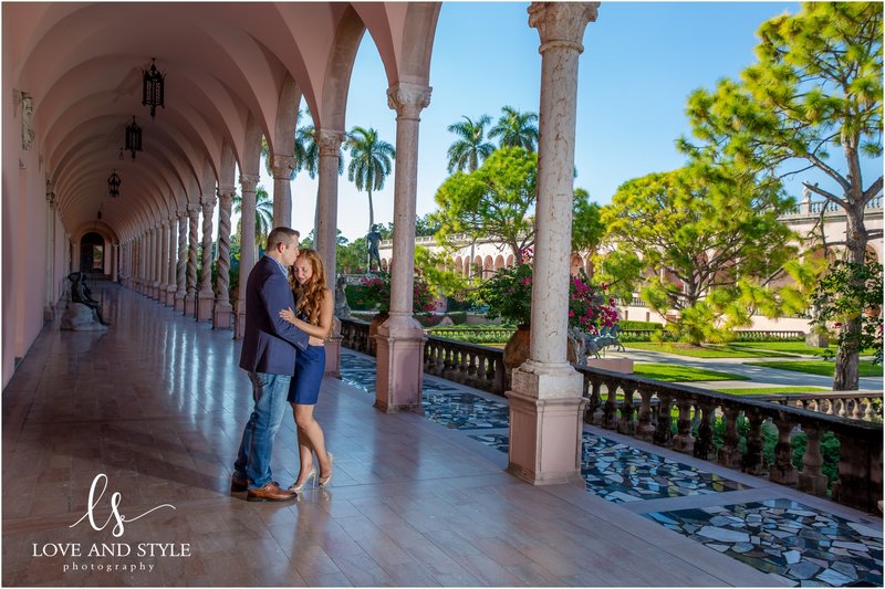 engaged couple embracing in the courtyard at The Ringling museum in Sarasota, Fl
