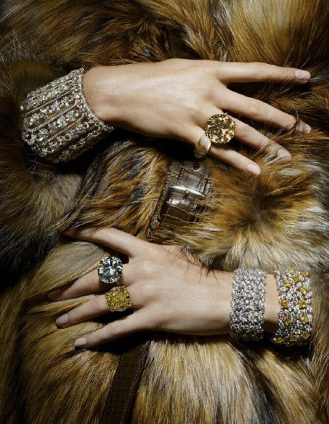 gold fur and woman with rings
