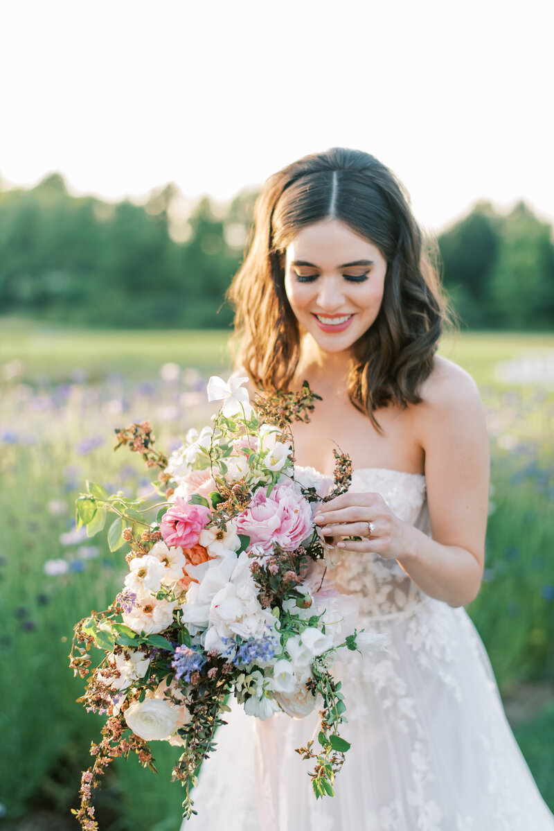 bride in garden of inn at perry cabin by maryland wedding photographer