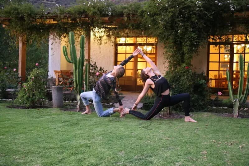 house grass yoga pose yoga teacher training peru