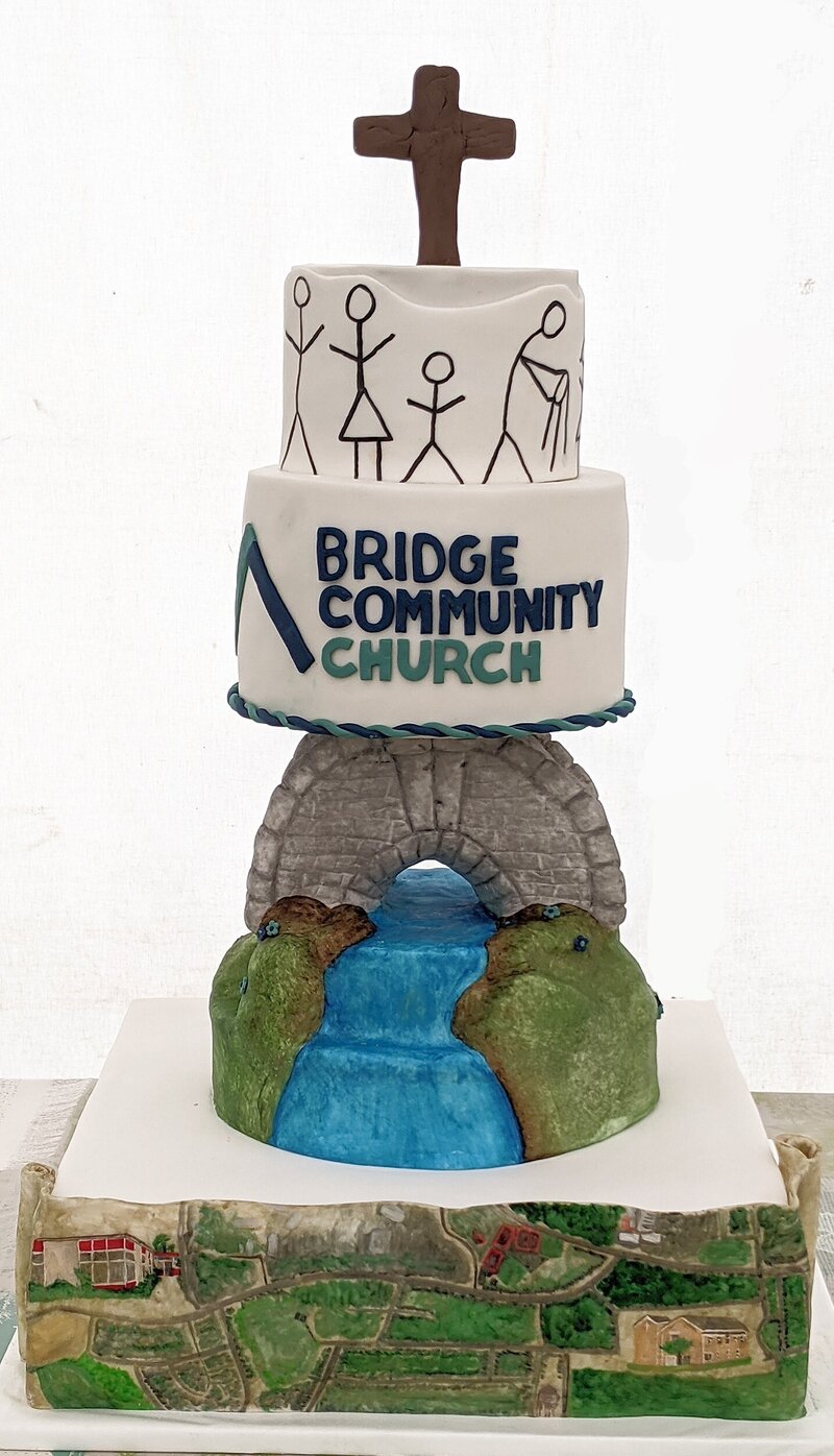 Handpainted map cake with bridge and waterfall cake for a new church naming event