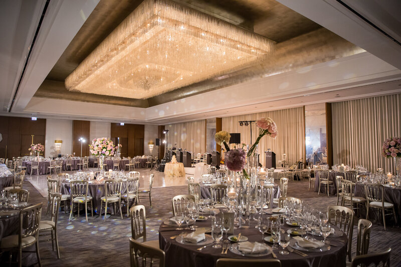 Modern wedding reception banquet hall with huge chandelier in Ritz Carlton in Chicago, IL