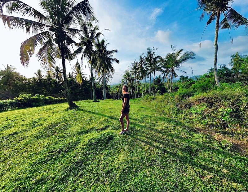 Personal Trainer hanging on fence