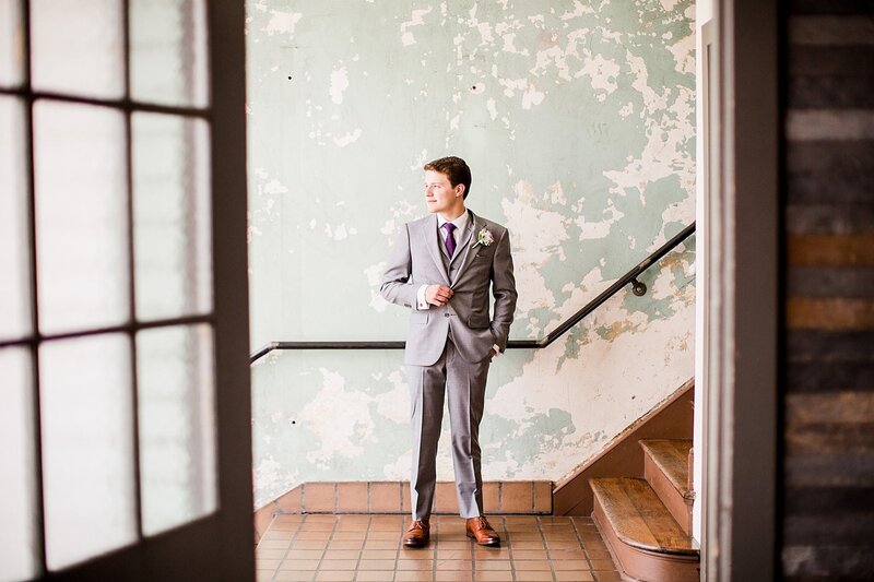 groom buttoning jacket by Knoxville Wedding Photographer, Amanda May Photos