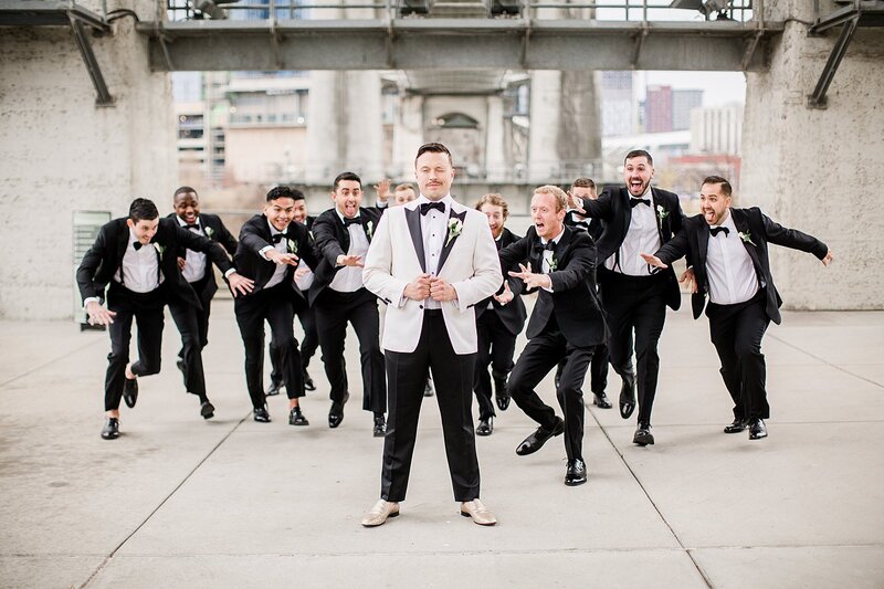 groomsmen jumping on groom by Knoxville Wedding Photographer, Amanda May Photos