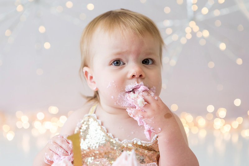 Baby eating cake