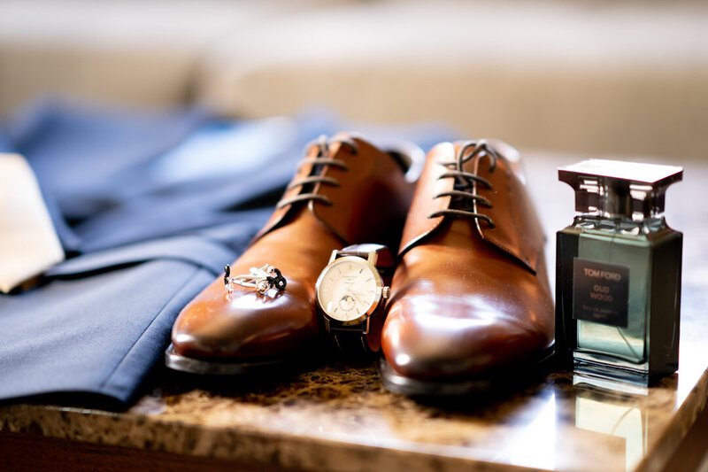 Groom shoes, watch, perfume and suit