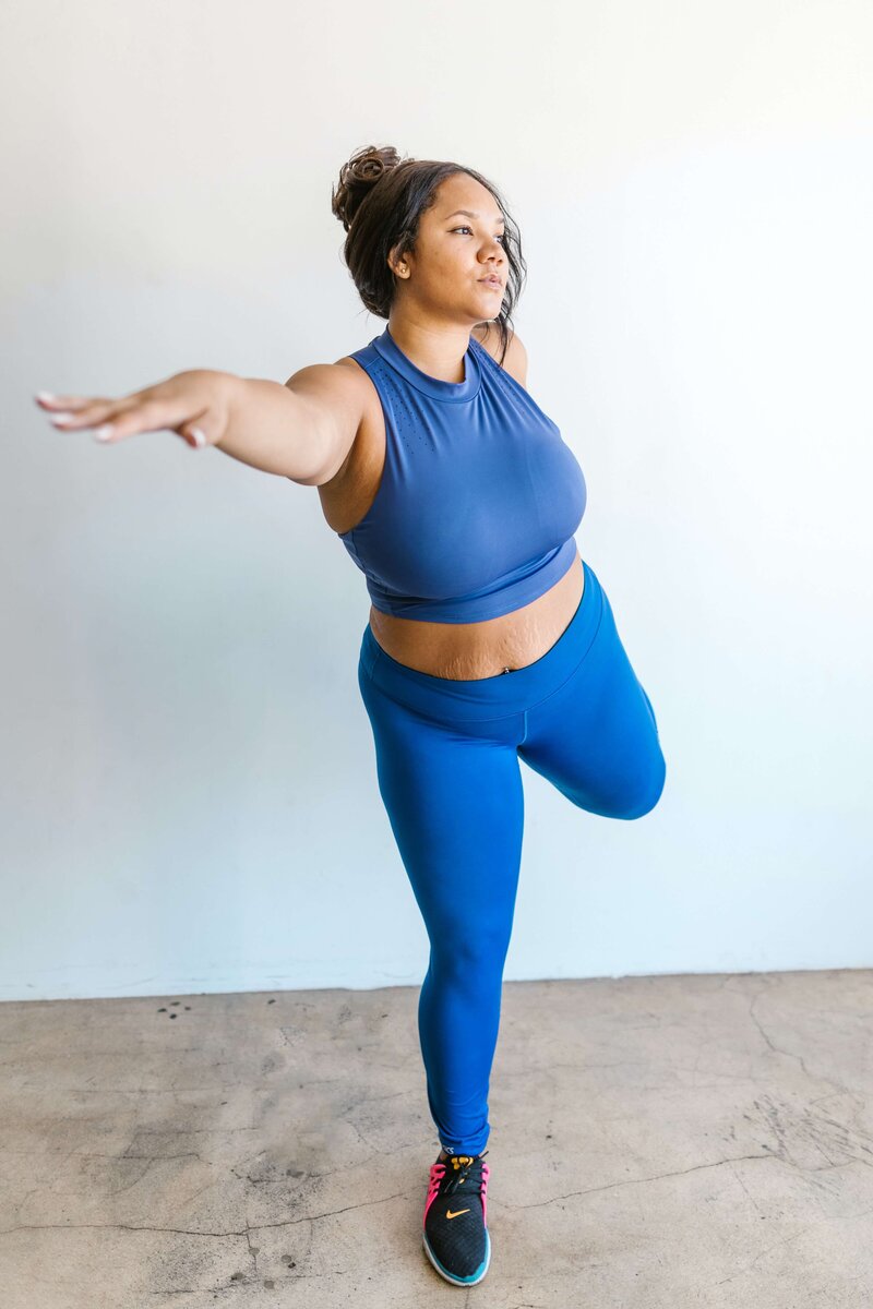 Woman yoga stretch instudio