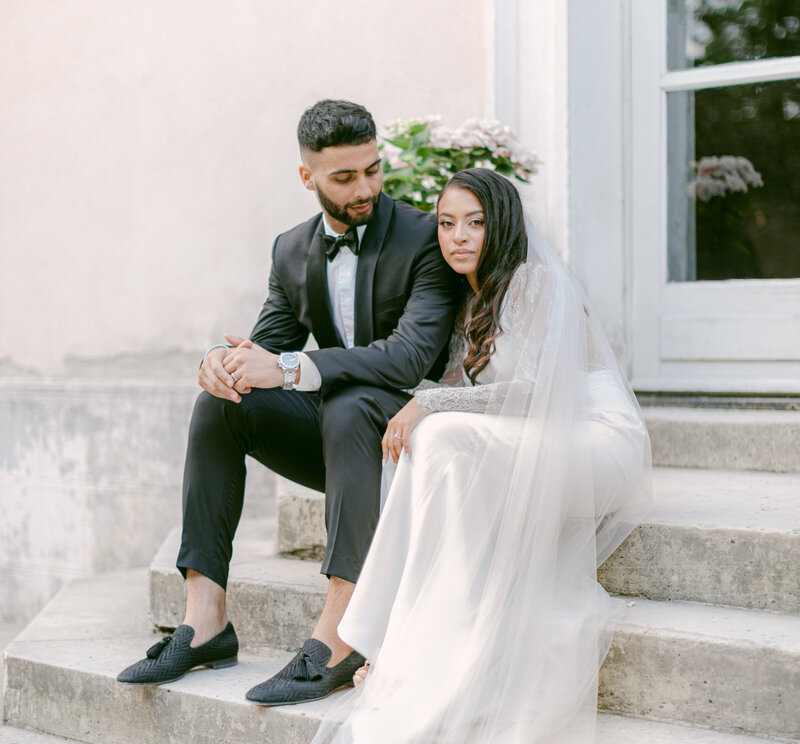 couple starirs wedding luxury chateau france photographer gigi fine art