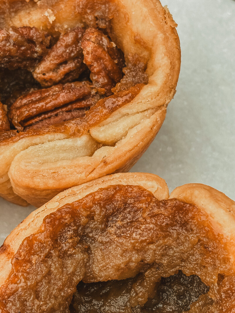 Homemade jumbo butter tarts. Gooey plain and perfect pecan butter tarts in Northern ON and Quebec. Delivered locally from our home bakery
