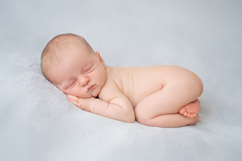 newborn-baby-posed-out-on-beanbag