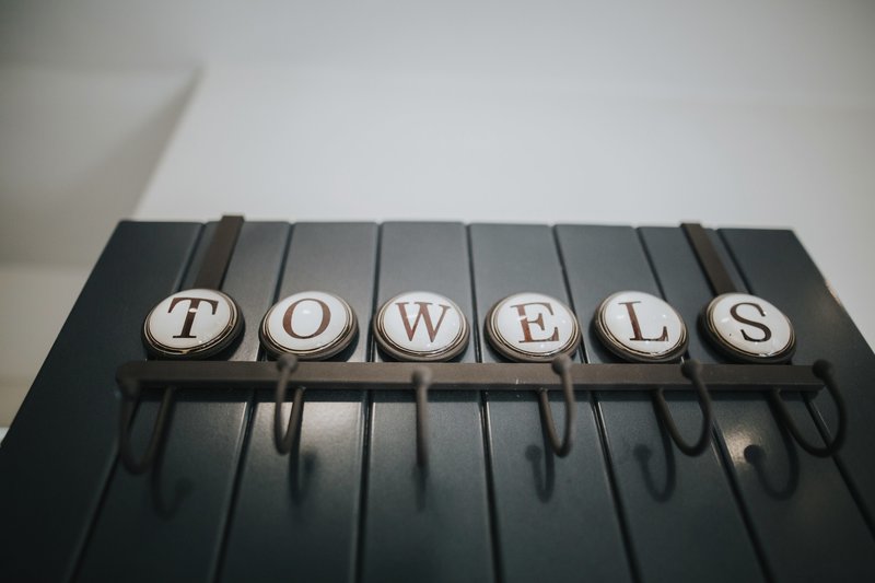 Towel Rack spelling out the word towels