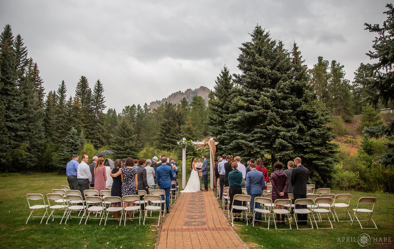 Outdoor Rainy Wedding During Summer at Wedgewood Weddings Mountain View Ranch