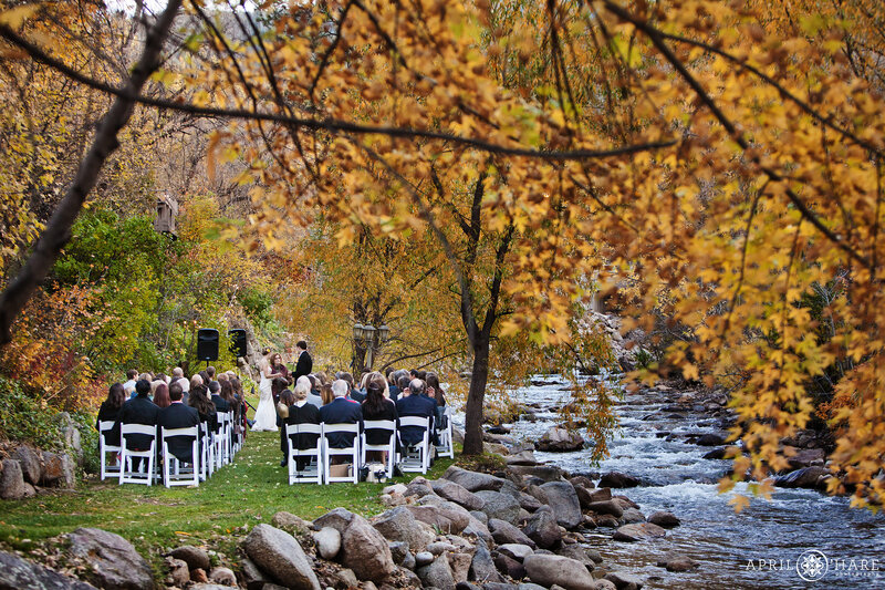 Fall Color Wedding Ceremony Next to Boulder Creek at Wedgewood Weddings in Colorado