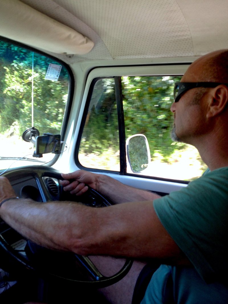 Warren driving our kombi Aggiee on a road trip, New Zealand