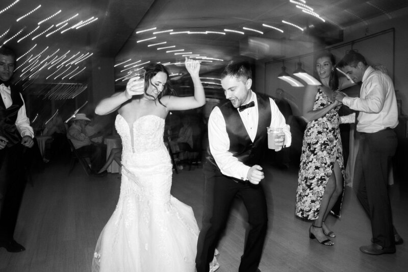 Bride and groom dancing together on the dance floor