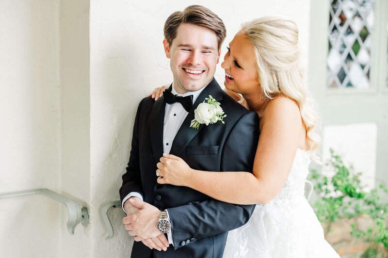 bride and groom laughing by knoxville wedding photographer