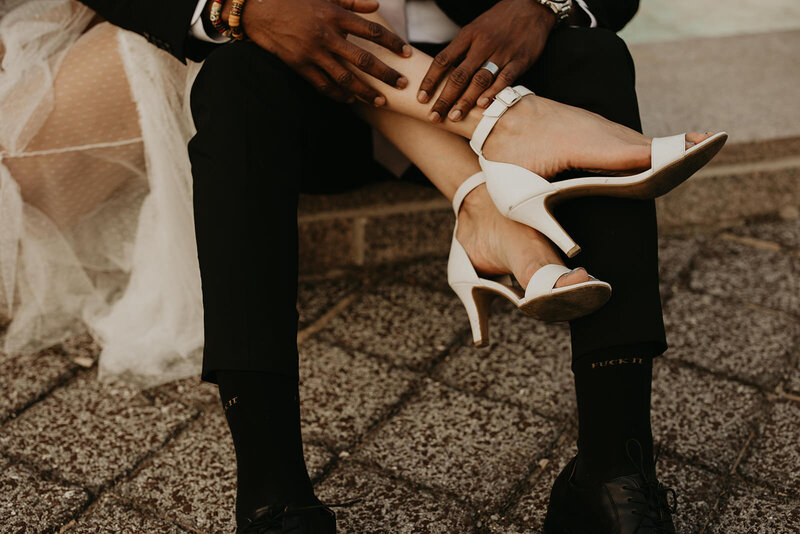 groom holding brides legs