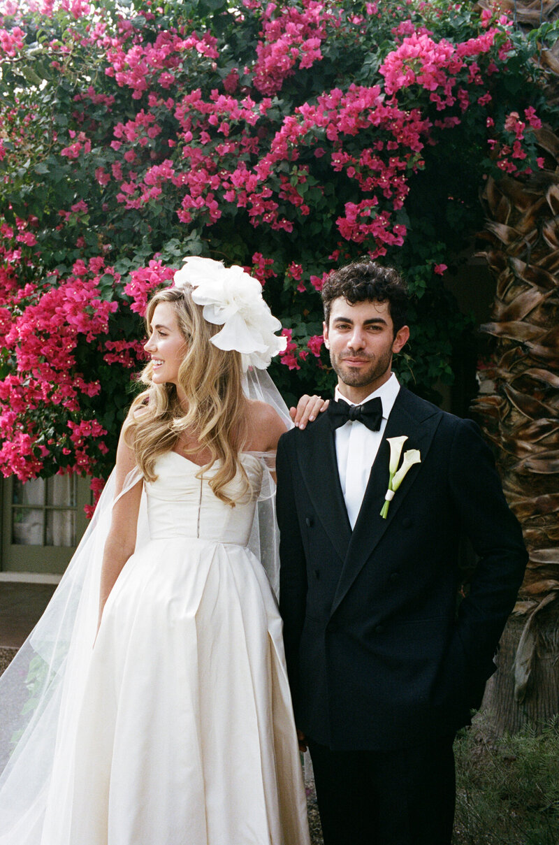 Bride and groom in Los Angeles standing in golden field